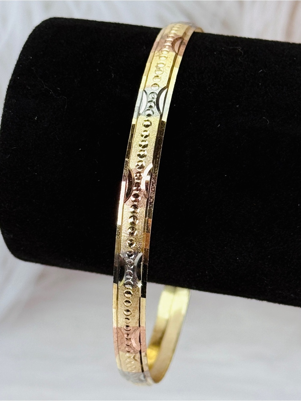 Goldtone Ornate Bangle Bracelet with Floral Motif